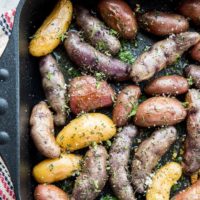 Garlic Roasted Potatoes - an easy recipe for herby garlicky fingerling potatoes with the perfect crisp. A delightful side dish to any meal!