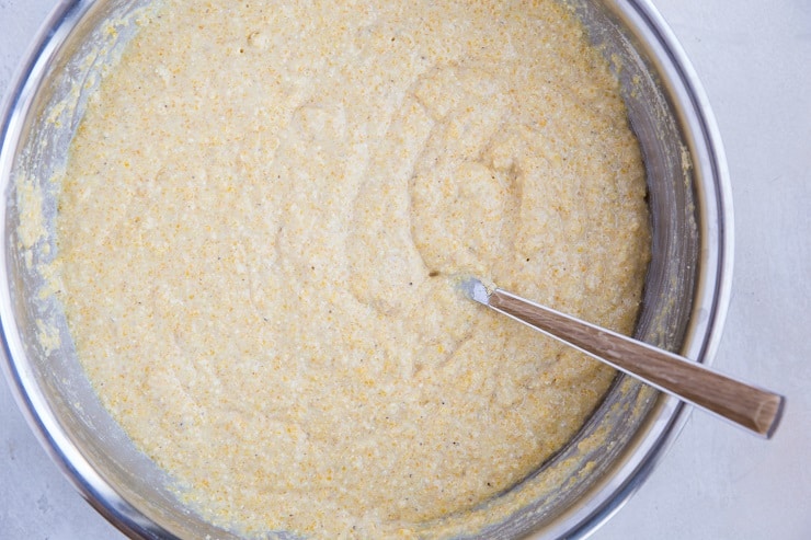 Gluten-free cornbread batter in a mixing bowl
