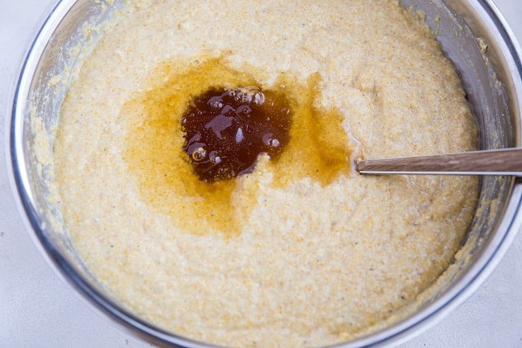 Cornbread batter with honey poured in