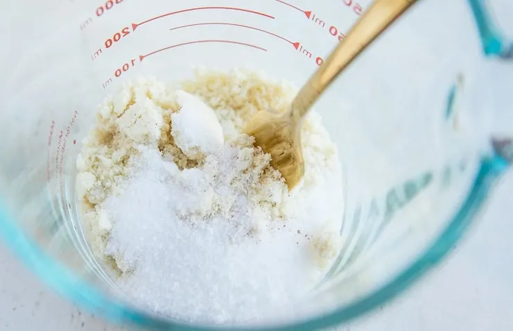 Mix the flour and sugar for a snickerdoodle in a mug