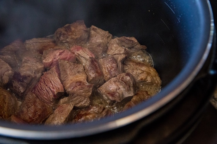 Add the beef to sear on two sides