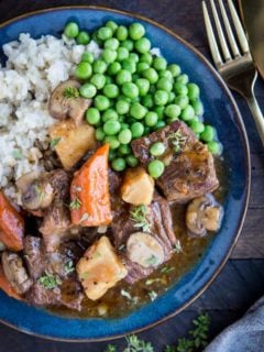 Instant Pot Beef Bourguignon - an easy gluten-free beef bourguignon recipe made in the pressure cooker. Perfectly tender beef stew with carrots