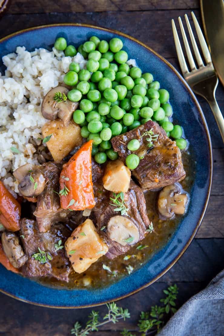 Instant Pot Beef Bourguignon - an easy gluten-free beef bourguignon recipe made in the pressure cooker. Perfectly tender beef stew with carrots