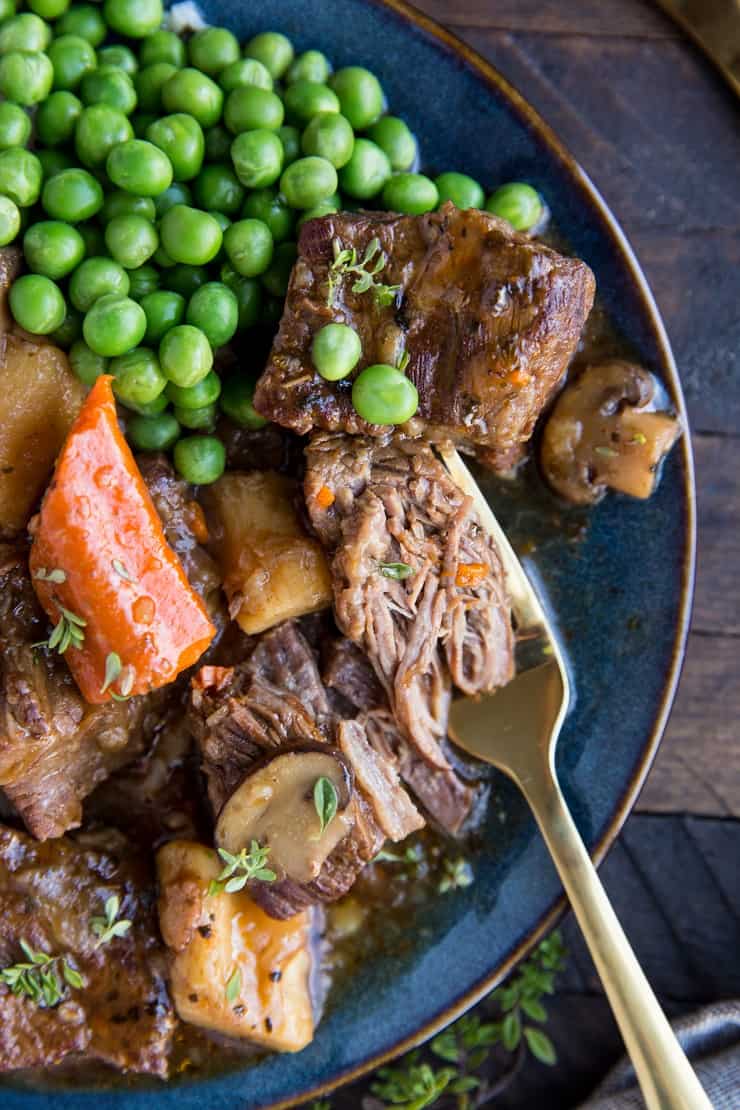 Instant Pot Beef Bourguignon - an easy gluten-free beef bourguignon recipe made in the pressure cooker. Perfectly tender beef stew with carrots