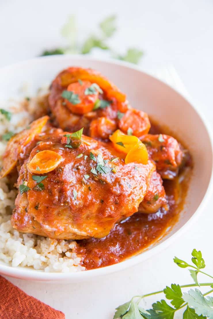 Easy Instant Pot Chicken Cacciatore in less than an hour. This simple Italian classic of chicken stewed in tomato sauce with peppers and carrots is a true delight and so easy to make