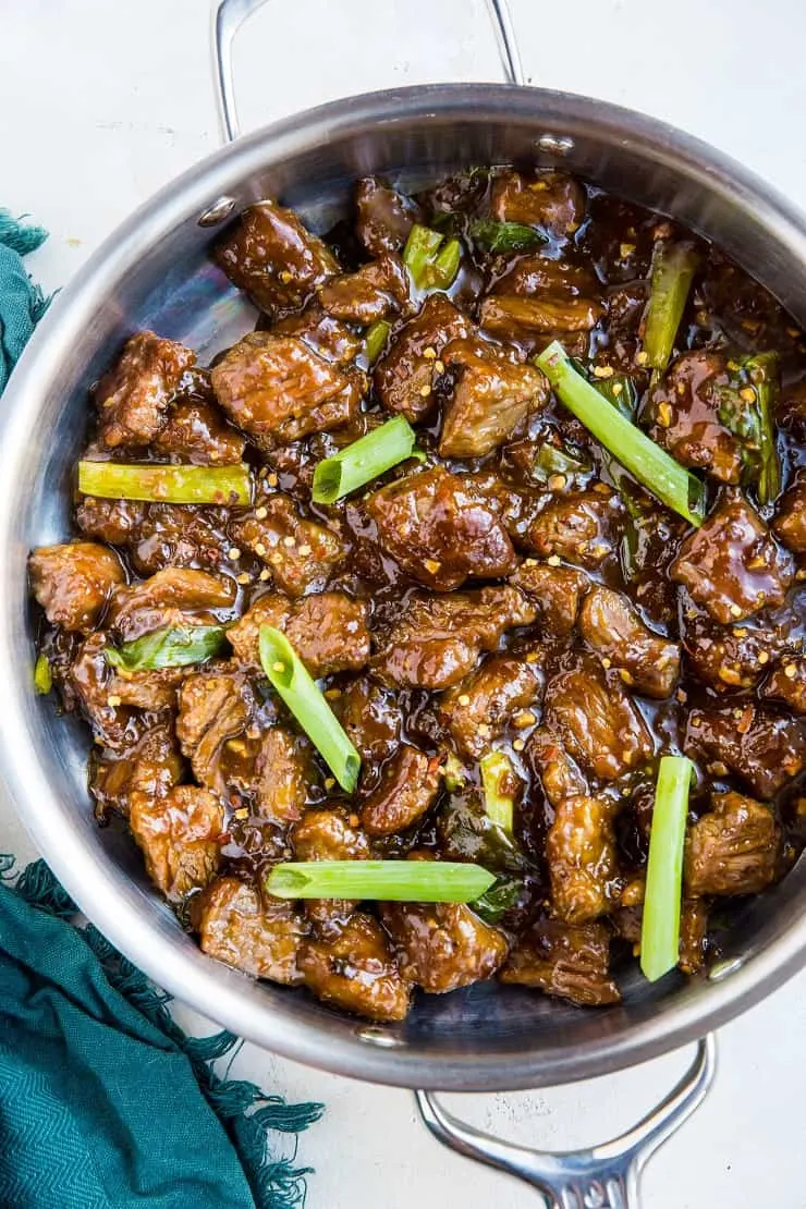 Paleo 30-Minute Mongolian Beef - an easy recipe for Mongolian beef that is soy-free, refined sugar-free and healthier! Crispy beef in amazing sauce? Who could resist?