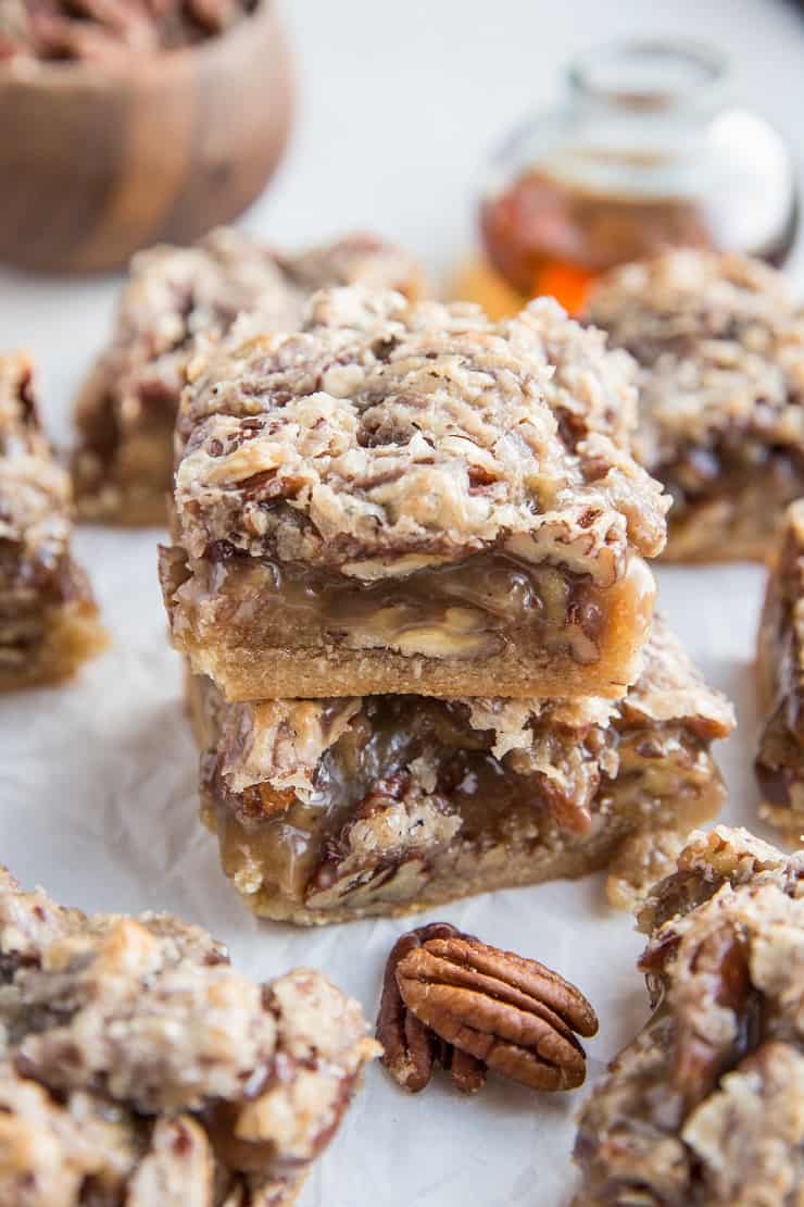 Paleo Pecan Pie Bars - Grain-free, refined, sugar-free and dairy-free pecan pie bars made with almond flour. A delicious cleaner dessert recipe!