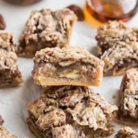 Grain-Free Vegan Pecan Pie Bars that are paleo, dairy-free, refined sugar-free and healthier. A delicious gooey caramel pecan bar on a shortbread crust