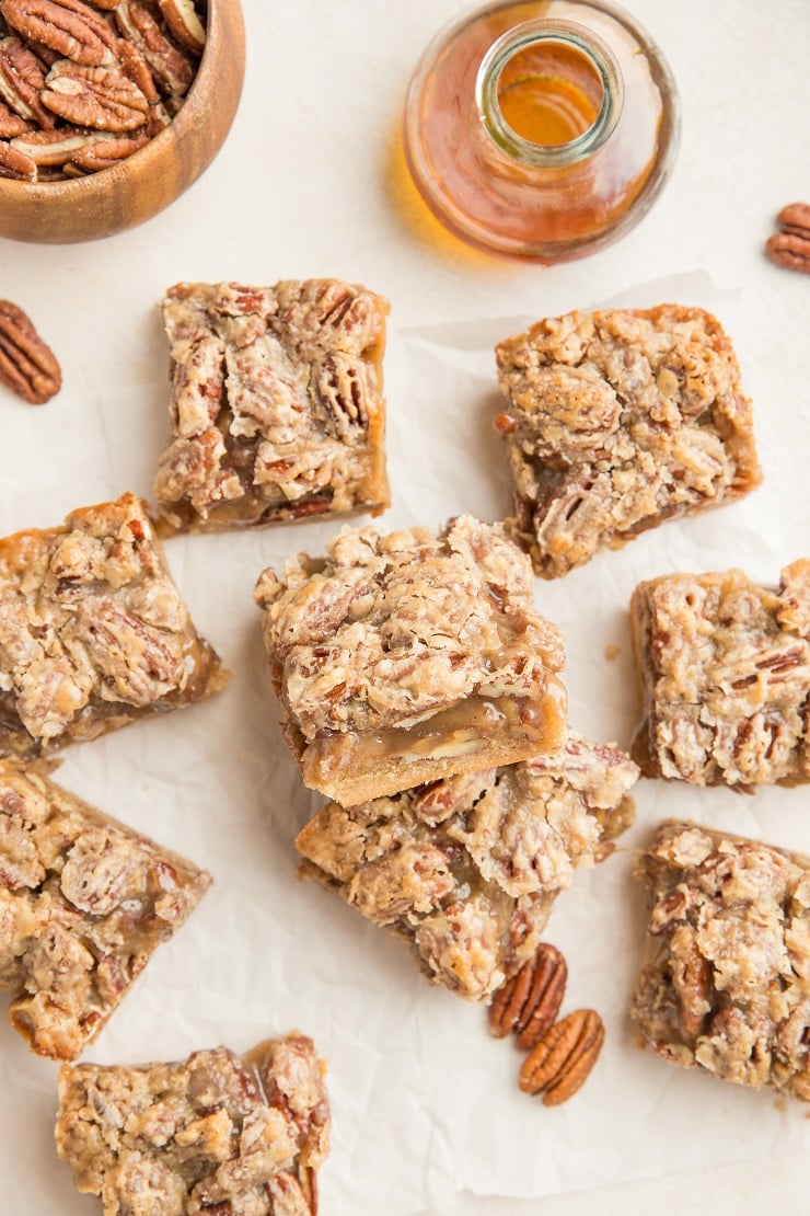 Grain-Free Vegan Paleo Pecan Bars - almond flour shortbread crust with gooey pecans in homemade caramel sauce