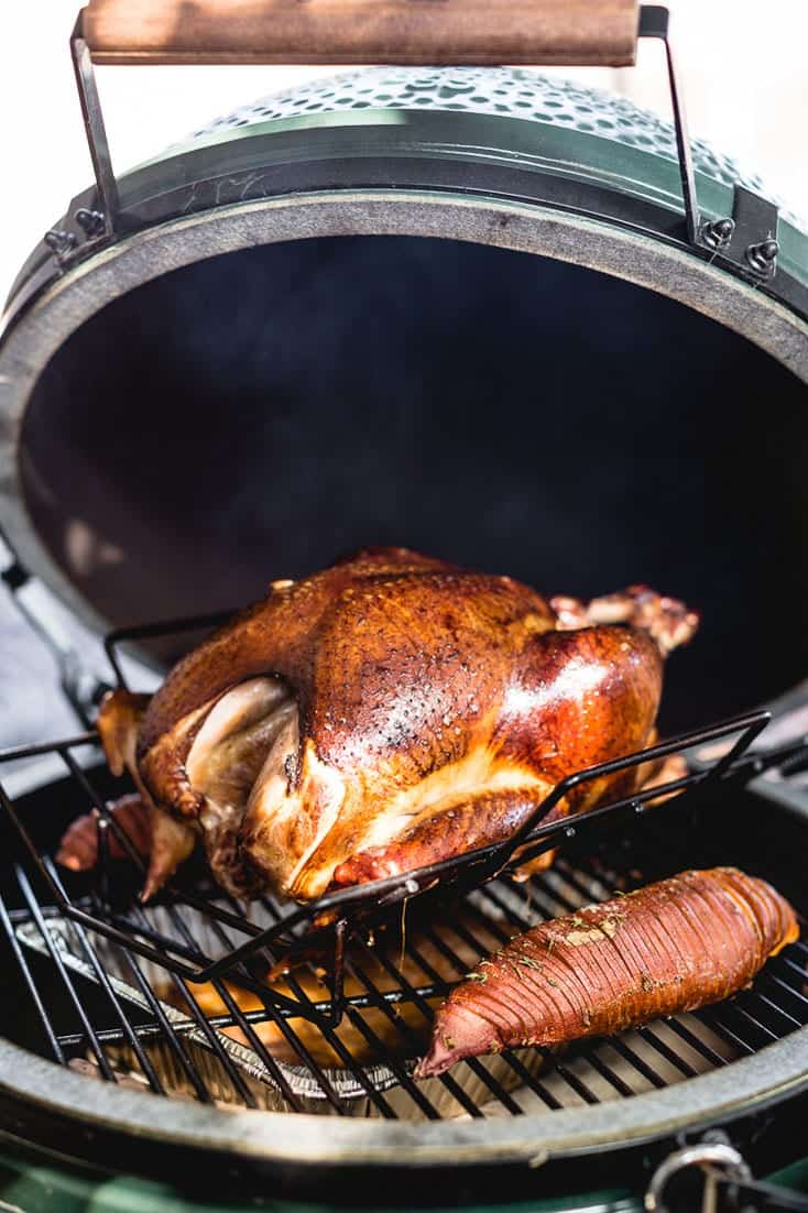 Perfect Smoked Turkey Recipe from Salt and Pepper Kitchen - Why smoke a turkey? The main reason to smoke your turkey is it will taste fantastic. And it will taste like a Thanksgiving turkey: the smoky flavor won’t overwhelm the bird’s natural delicate flavor, and the flesh will retain tenderness moisture much better than with roasting. It’s also at least as easy as a roasted bird, and takes little or no more time.