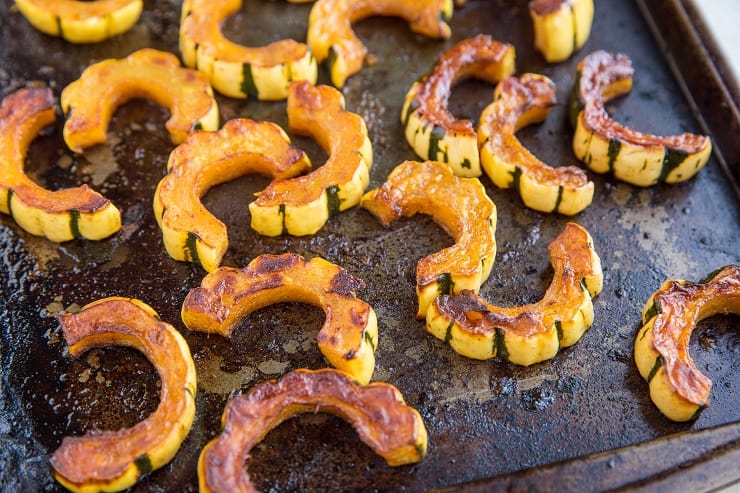 Maple Roasted Delicata Squash - cut the delicata squash in half