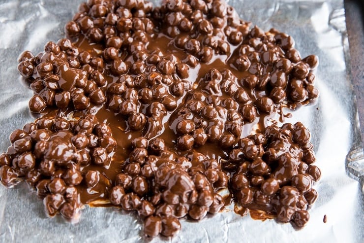 Chocolate covered chickpeas on a sheetpan