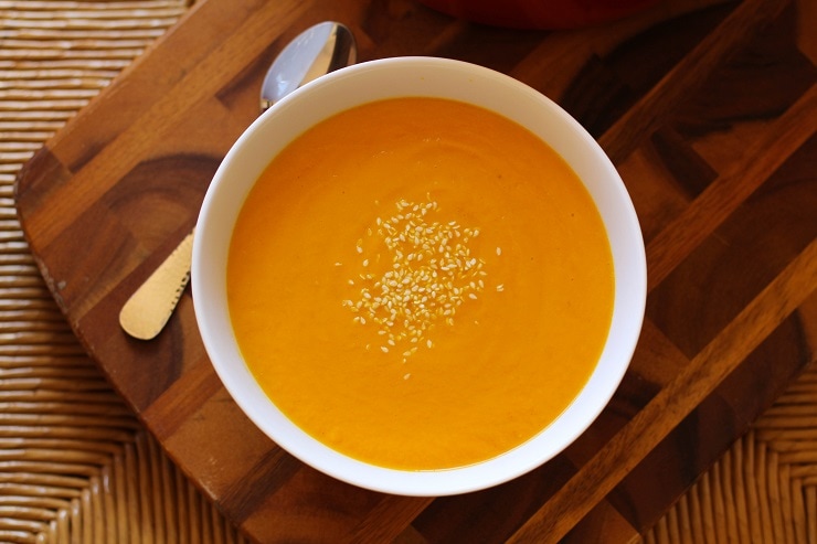 Creamy Carrot Ginger Soup with coconut milk and Thai flavors. An easy nutritious soup recipe that is loaded with vitamins, antioxidants and is a boost to the immune system