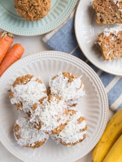 Hand holding half of a carrot cake muffin