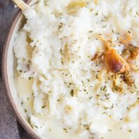 Easy Mashed Cauliflower with roasted garlic - creamy mashed cauliflower is a low-carb keto replacement for mashed potatoes. Healthy, flavorful, delicious!