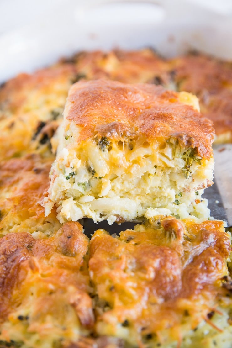 Broccoli Cheddar Egg Hashbrown Casserole Recipe - an easy potato casserole recipe that is cheesy, loaded with broccoli and bacon for an amazing big batch breakfast!