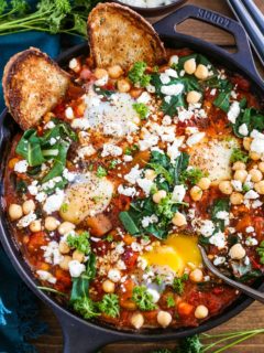 Eggplant Chickpea and Chard Shakshuka - a healthy delicious poached eggs in tomato sauce recipe.
