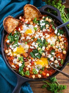 Eggplant Chickpea and Chard Shakshuka - a healthy delicious poached eggs in tomato sauce recipe.