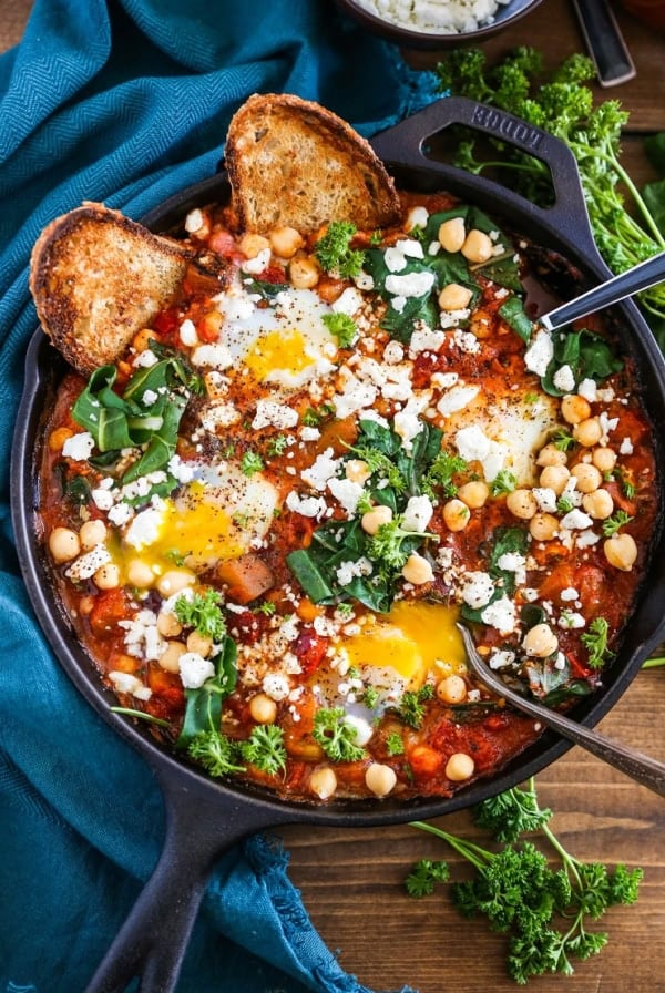 Eggplant Chickpea and Chard Shakshuka - a healthy delicious poached eggs in tomato sauce recipe.