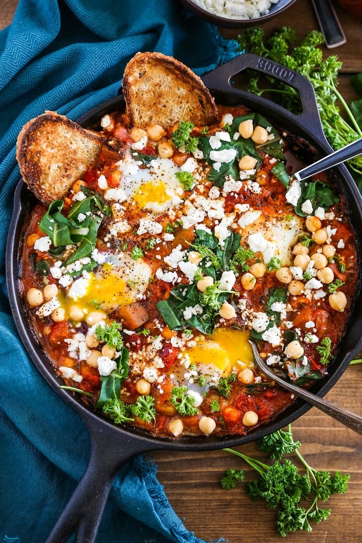 Eggplant Chickpea and Chard Shakshuka - a healthy delicious poached eggs in tomato sauce recipe. 