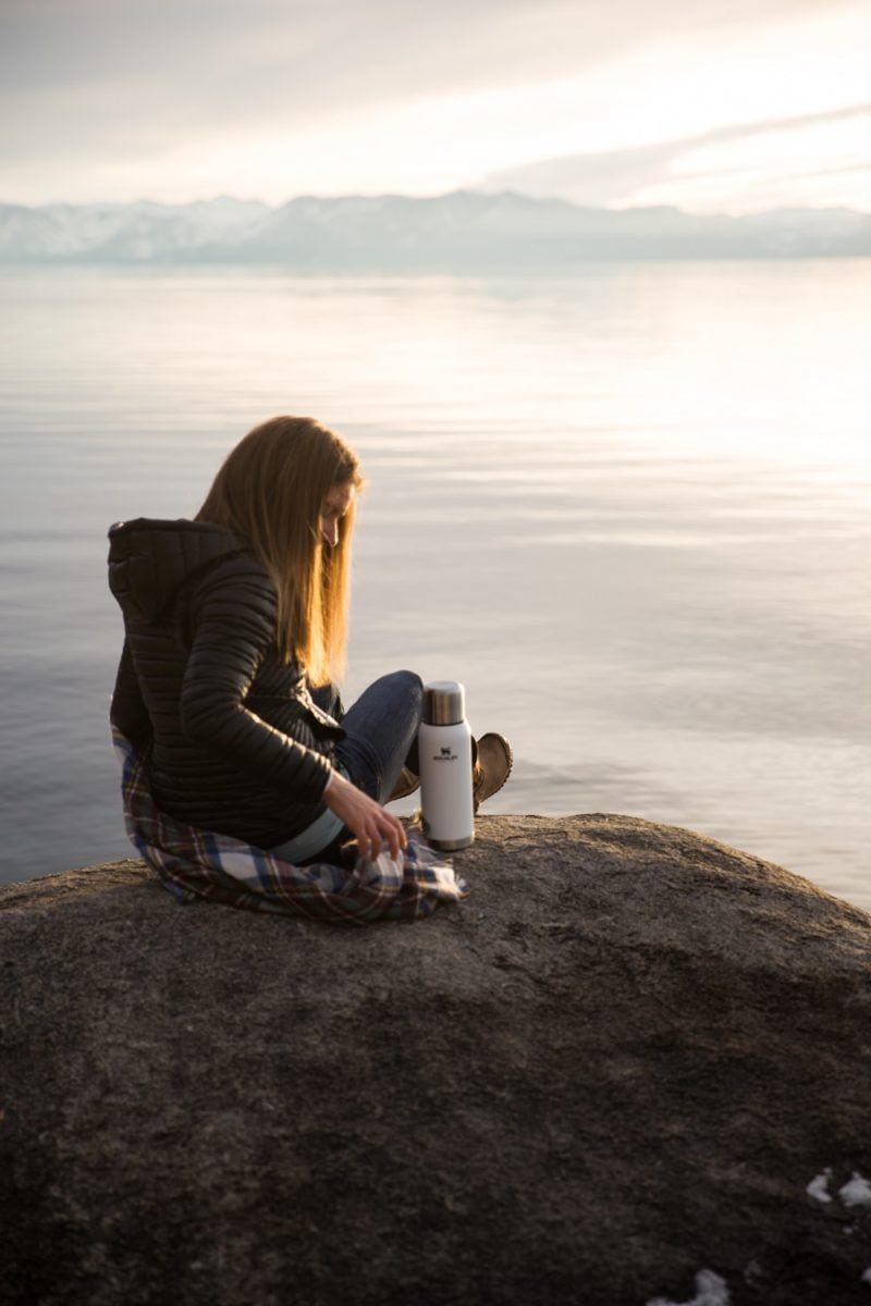 Julia Mueller at Lake Tahoe on a rock