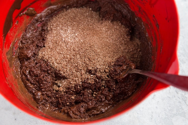 Mixing bowl with brownie batter for mug brownies