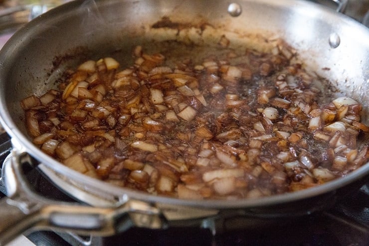 Sauté the onions for adobo chicken