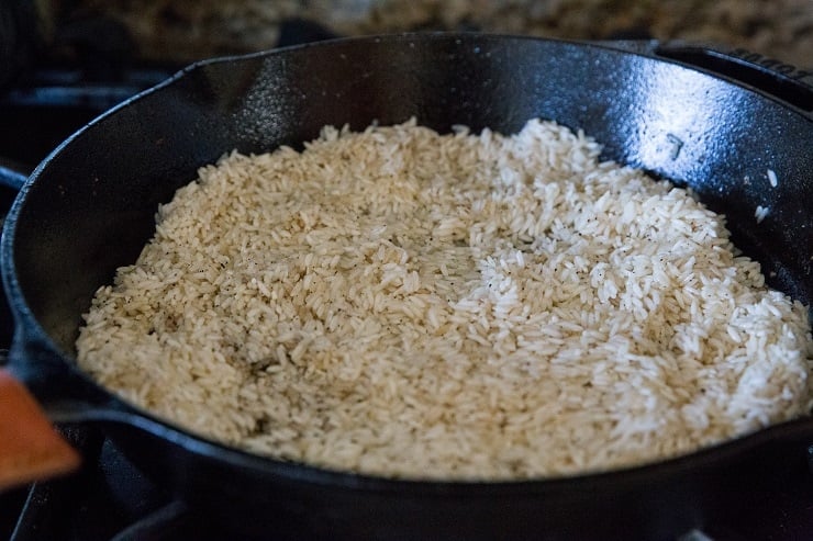 Brown the rice in a skillet