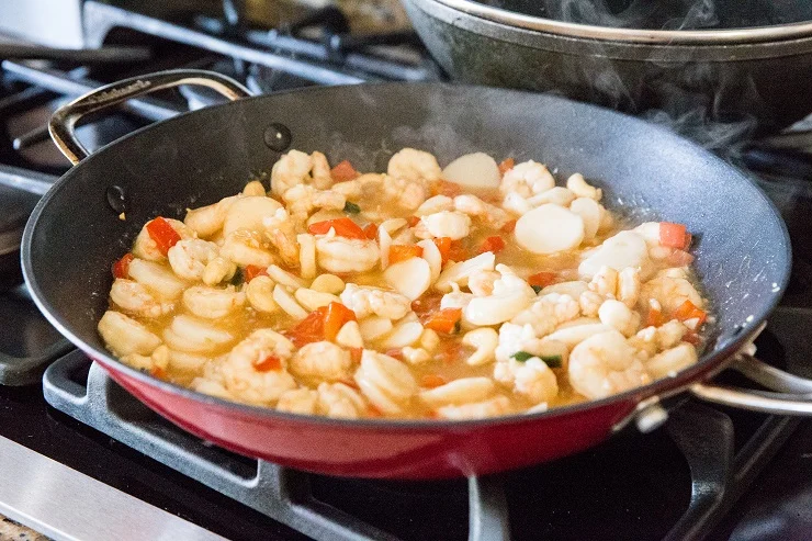 Allow shrimp to cook and the sauce to thicken