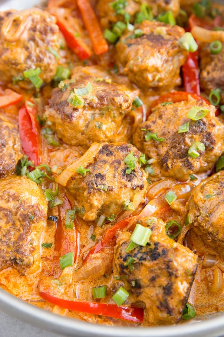 Thai Turkey Meatball Curry - amazing, tender meatballs in a creamy coconut milk red curry sauce. Easy and delicious!