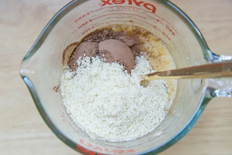 Add the almond flour and cacao powder