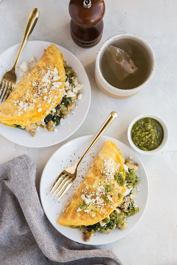 Pesto Chicken Omelettes with feta cheese and spinach are an amazing breakfast that's so easy to make