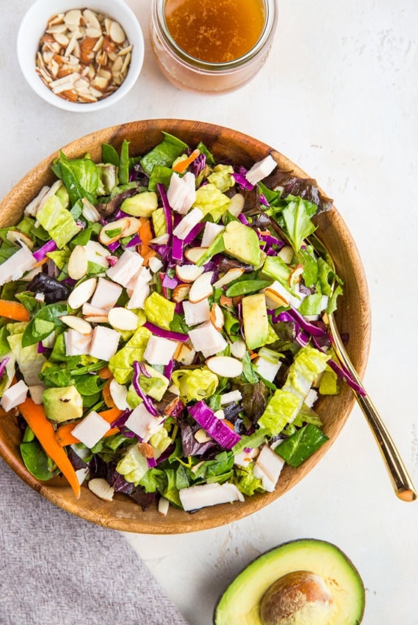 Sesame Turkey Avocado Chopped Salad with ginger sesame dressing and sliced almonds. A healthy, filling salad dressing recipe - paleo, whole30, low-carb, nutritious.