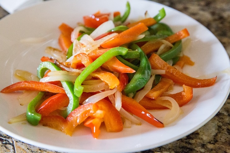 Sauté the vegetables and transfer them to a plate