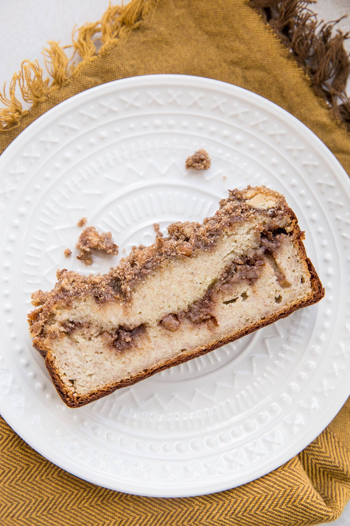 Slice of cinnamon swirl banana bread on a plate