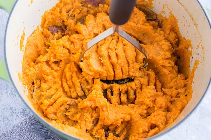 Mash the sweet potatoes until creamy