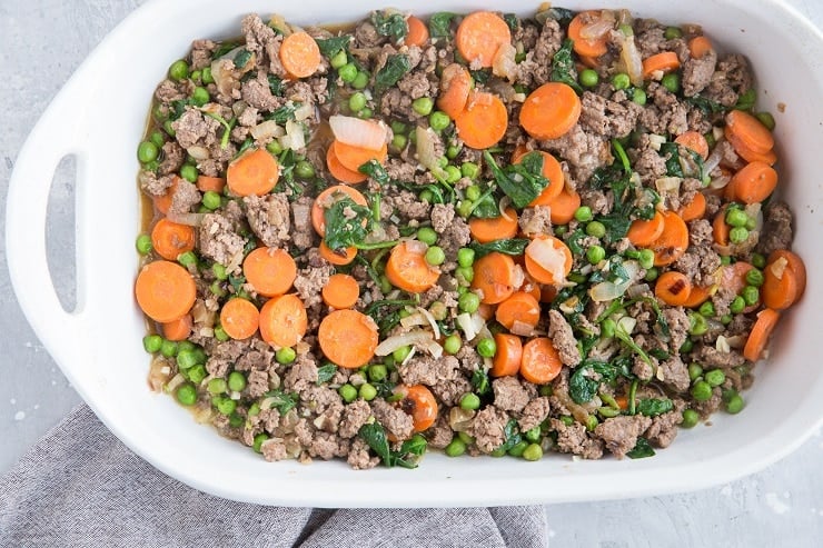 Transfer the meat and vegetables to a casserole dish and top with mashed sweet potatoes