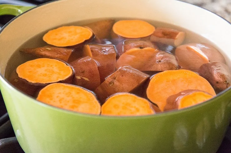 Boil the sweet potatoes in a large pot until tender