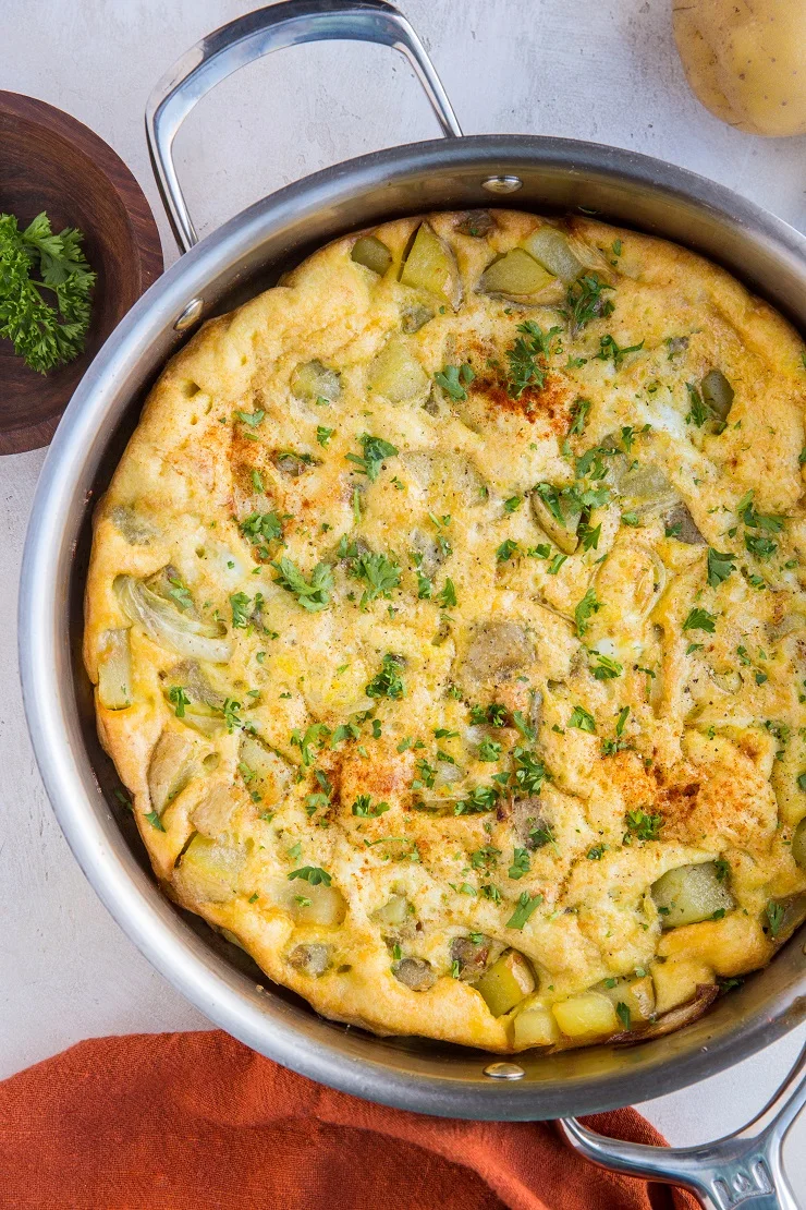 Easy Spanish Omelette Recipe - a thick, delicious Spanish style omelette with potatoes and onions. Also known as a Spanish Tortilla