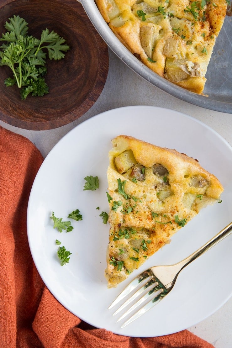 Easy Spanish Omelette Recipe - a thick, delicious omelette with potatoes and onions. Also known as a Spanish Tortilla