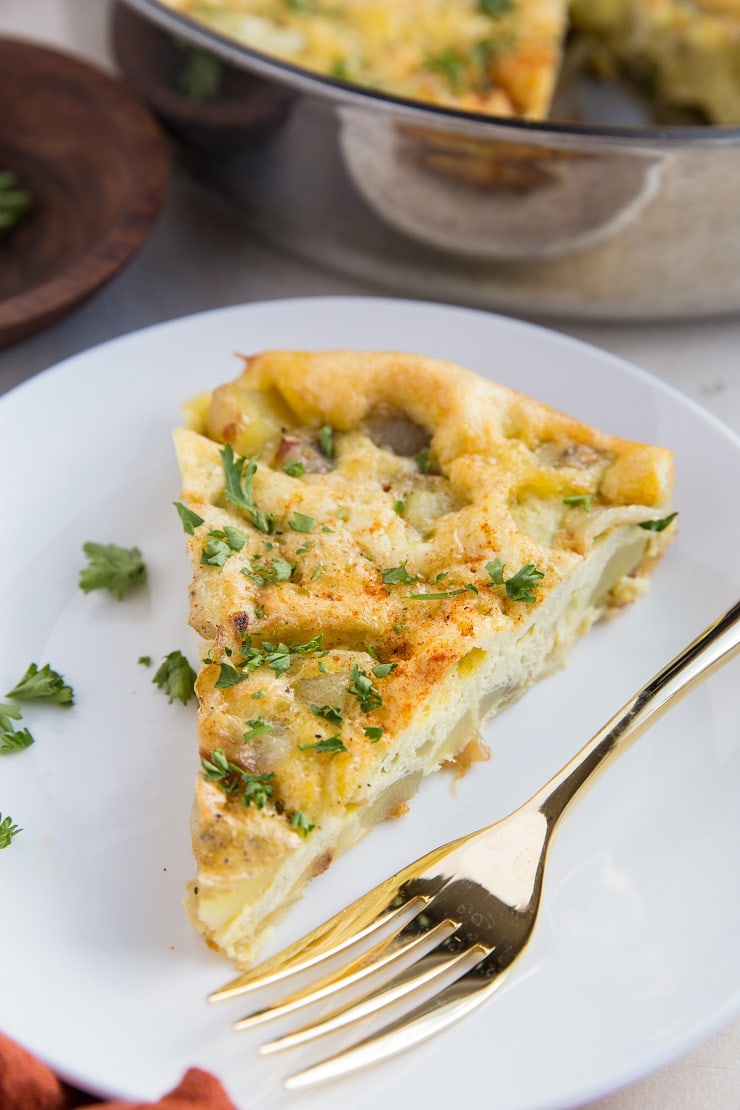 Quick and easy Spanish Tortilla recipe - also known as a Spanish Omelette. Eggs, potatoes, and onion cooked to omelette perfection