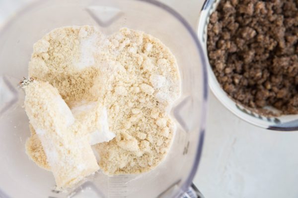 Almond flour cinnamon swirl banana bread ingredients in a blender, ready to be blended to be made into batter.