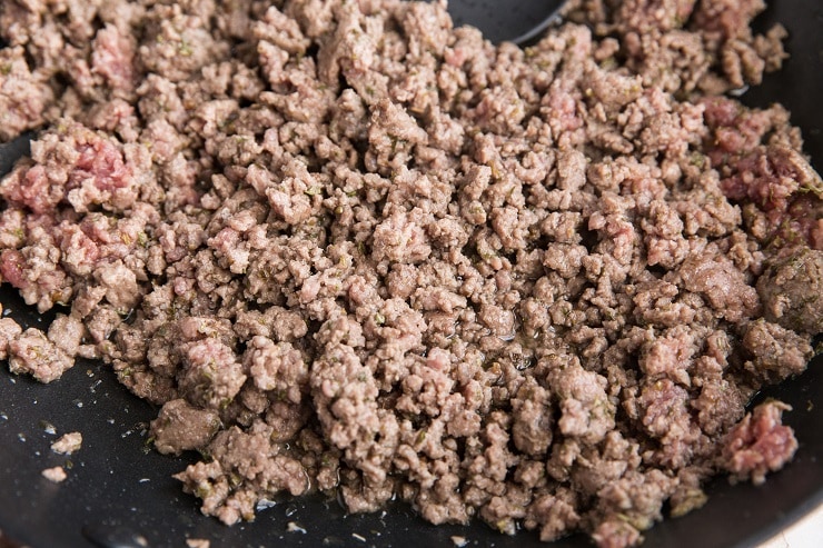 Ground beef cooking in a skillet