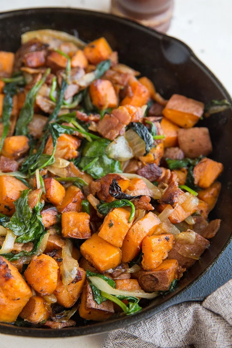 Easy Sweet Potato Hash Recipe with onions, bacon, and spinach