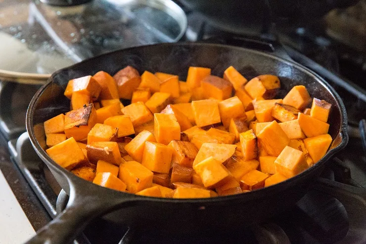 Cook the sweet potatoes in cast iron until crispy.