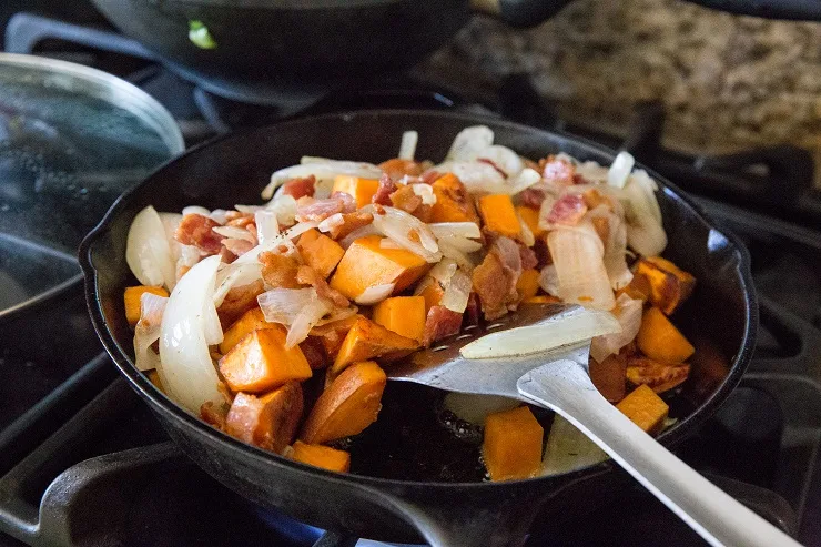 Add the bacon and onions back to the skillet
