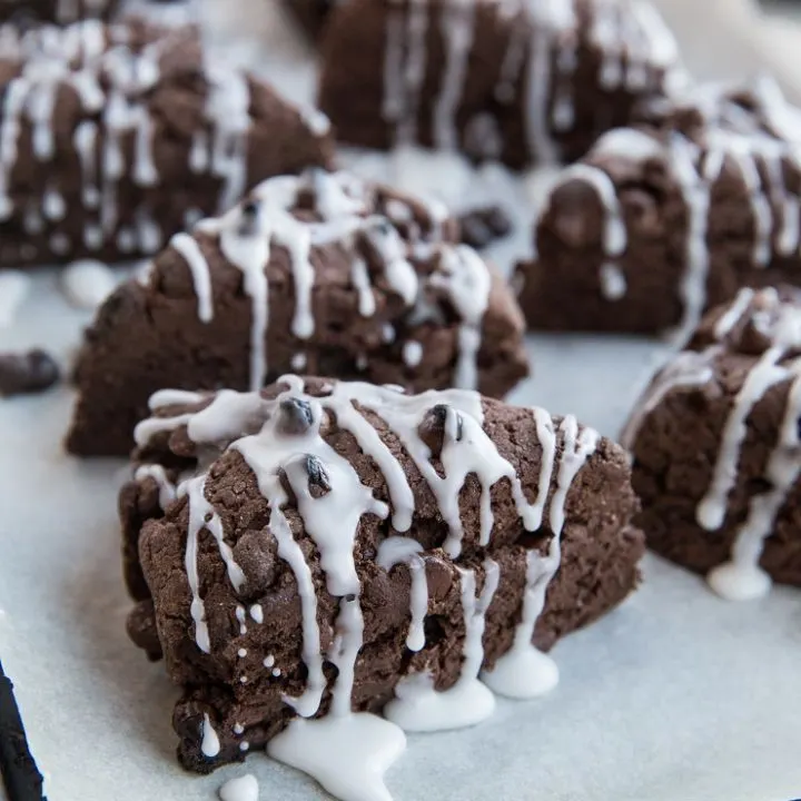 Gluten-Free Vegan Chocolate Scones with chocolate chips and an easy glaze. These delicious scones are perfect for sharing with family for brunch