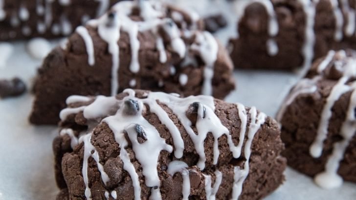 Gluten-Free Vegan Chocolate Scones with chocolate chips and an easy glaze. These delicious scones are perfect for sharing with family for brunch