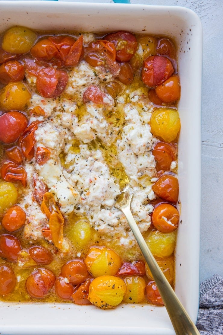 Mash the feta and tomatoes with a fork until a creamy sauce forms