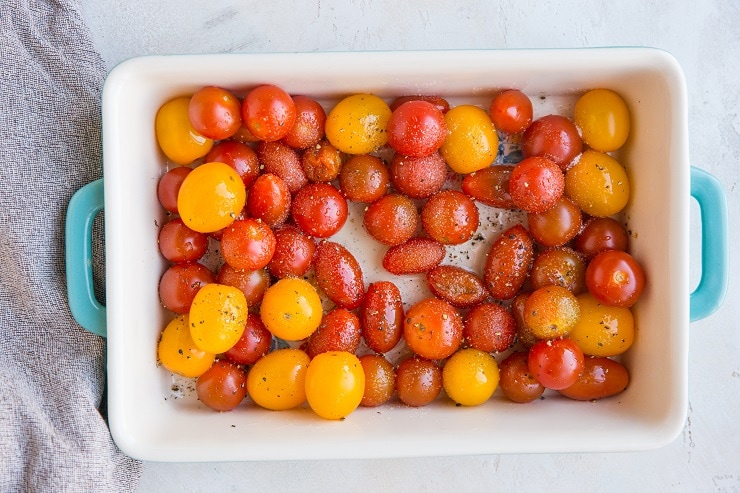 Add cherry tomatoes to a casserole dish